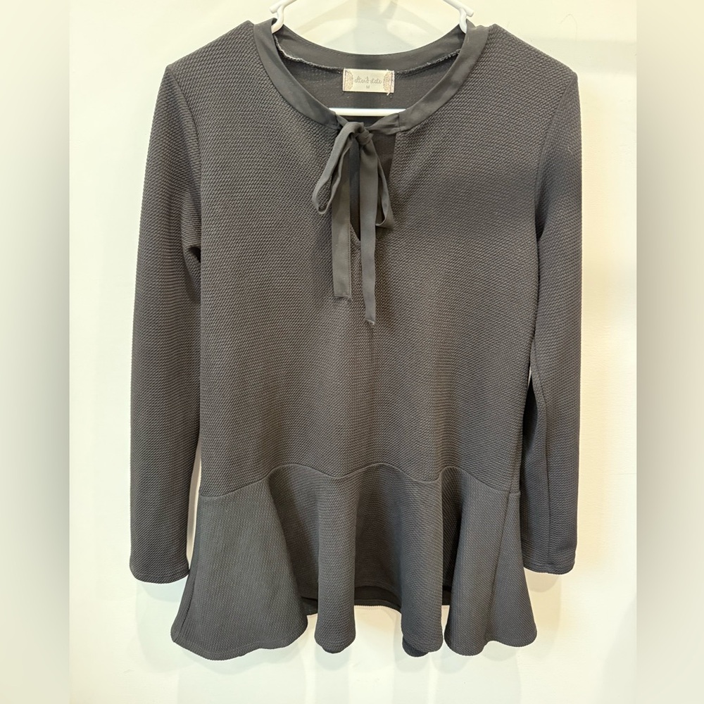 Altar'd State Charcoal Tie-Neck Peplum Long Sleeve Top - Picture 1 of 3